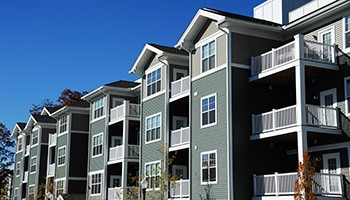 row of multi-story housing units