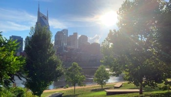 view of Nashville skyline as seen from a green space