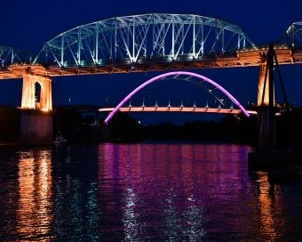 Korean Veterans Bridge lit with light purple LED lighting at night