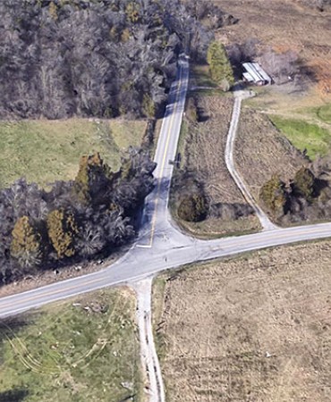 Before aerial view of the Blue Hold Road and Pettus Road intersection