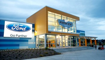 Front of Ford Ice Center building at dusk