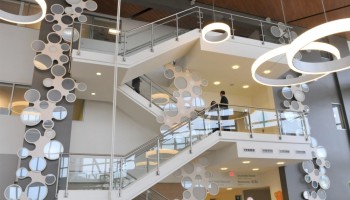 Interior view of Lentz Public Health Center, with focus on multi-level public stairway