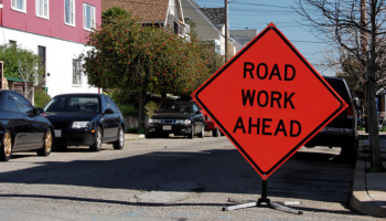 Road work ahead sign on residential roadway