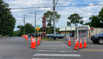 Photo of cones placed at a dangerous intersection on Dickerson Pike as part of a tactical urbanism project