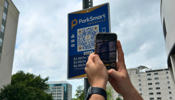 Using a smart phone to pay for curbside parking