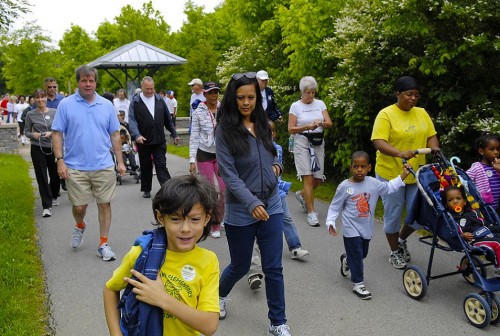 park visitors walking on path