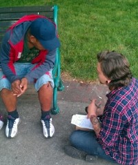 surveyor talking to a homeless person