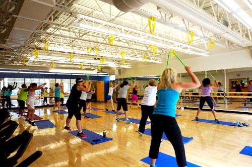 Patrons exercising in group fitness class
