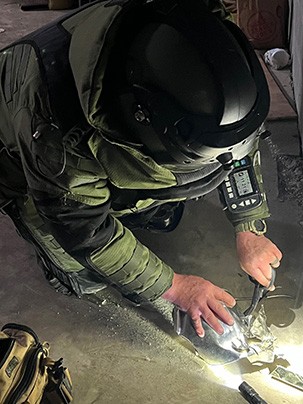 Officer in Hazardous Devices uniform working