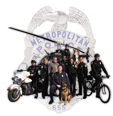 Photo showing several police officers in varying roles with Metro Police badge in background