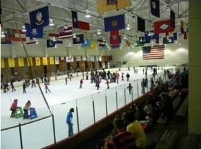 Photo of people ice skating on a public rink