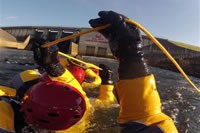 Photo of trainees in water for swift water rescue