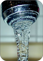 Photo of water running out of a faucet