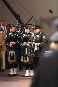 Photo of Metro Police bagpipers performing at ceremony
