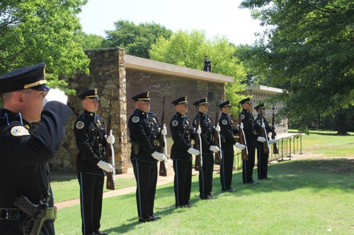 Metro Police Riflemen standing at attention with their rifles