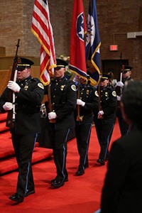 Metro Police flag team marching in formation