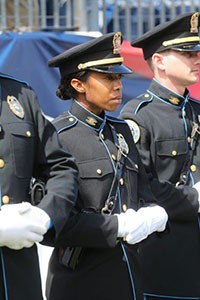 Metro Police standing at attention in dress uniform