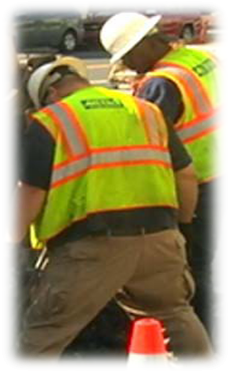employee uniform 2 - neon vest with khaki pants and hardhat