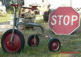 tricycle and stop sign