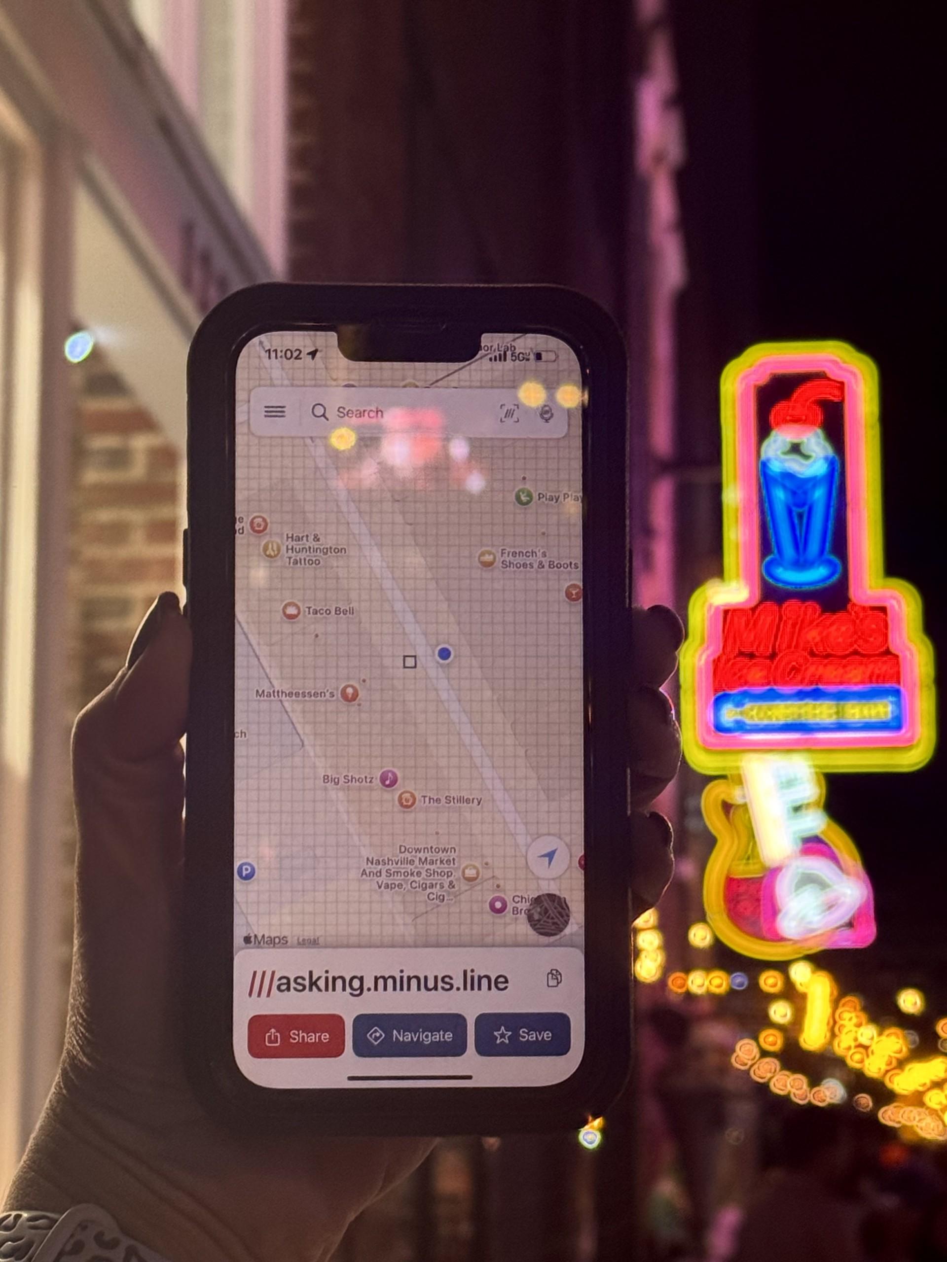 Cell phone with what3words app displayed