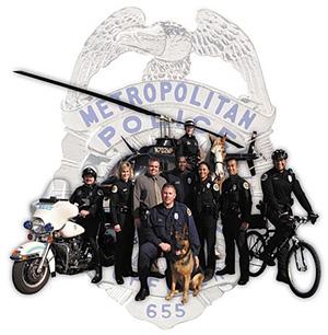 various kinds of police officers in front of a Metro Nashville Police badge