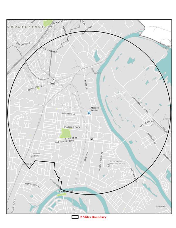 Map showing city streets and districts with highlighted boundaries and waterways in teal.
