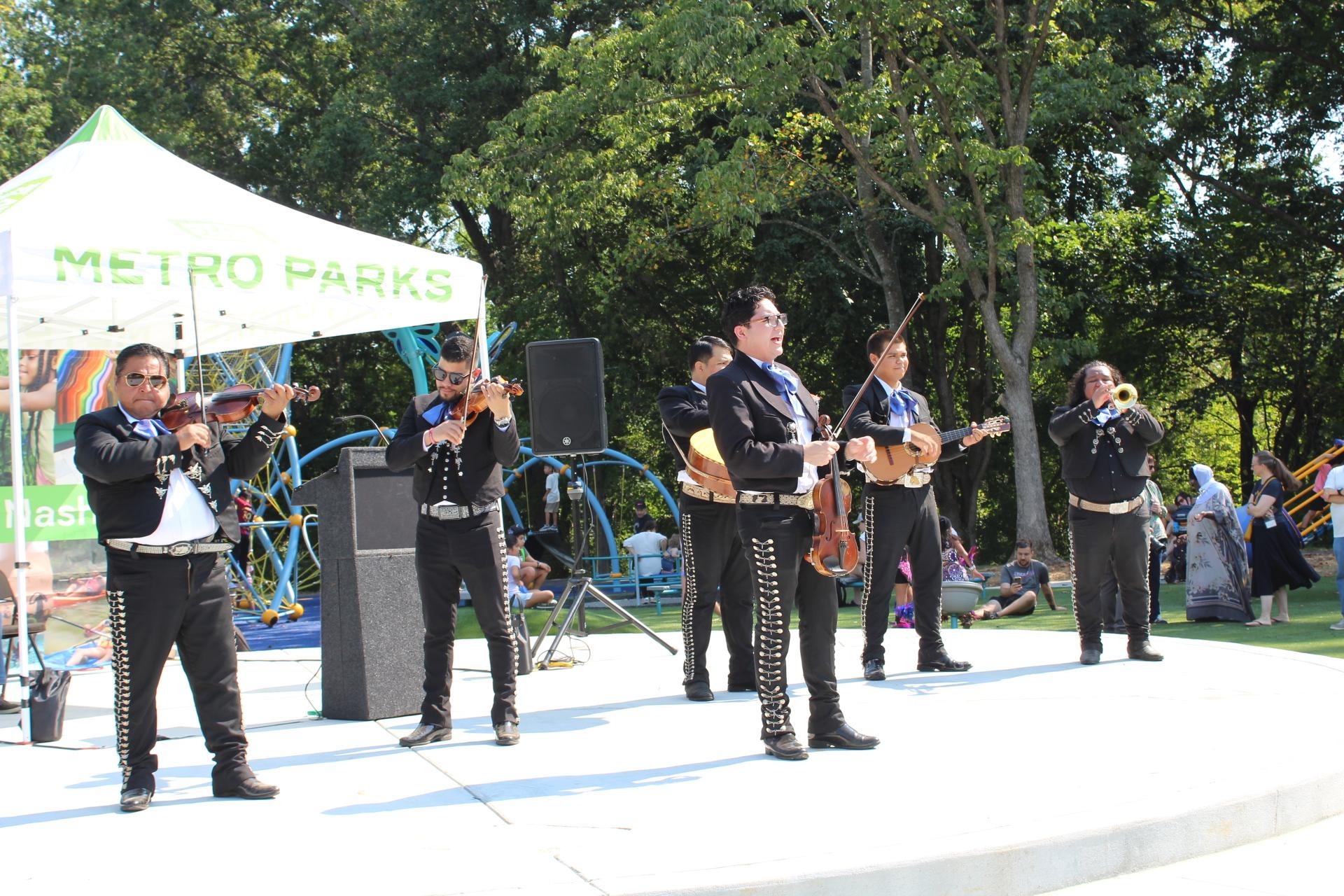 mariachi band performing on stage