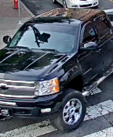 front of suspect's vehicle