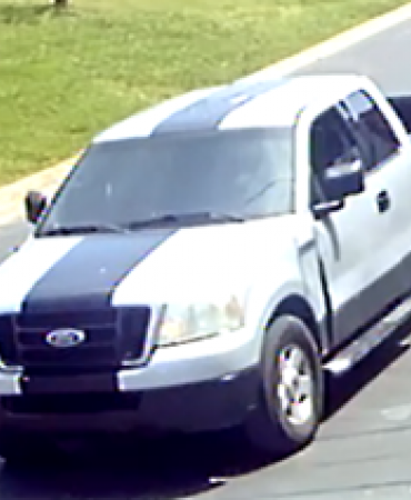 surveillance photo of suspect pickup truck
