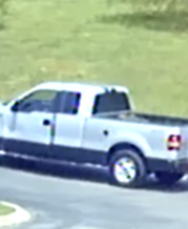 surveillance photo of suspect pickup truck