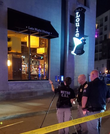 Detectives outside Bar Louie after fatal shooting