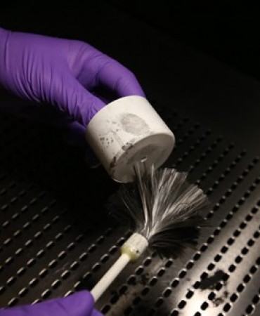 Dusting for fingerprints.