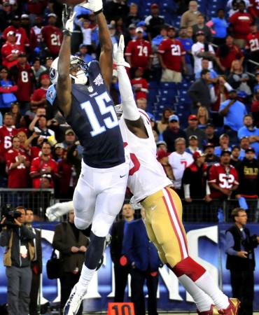 Titans player catching football