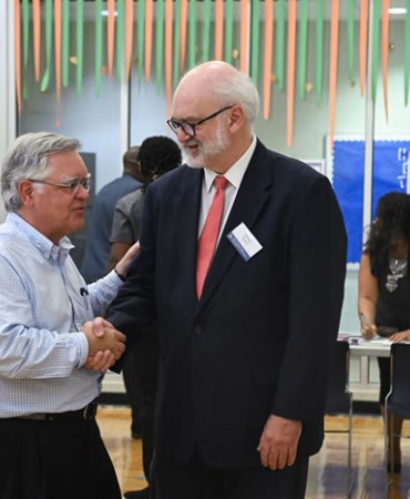 Mayor Greeting Meeting Participant