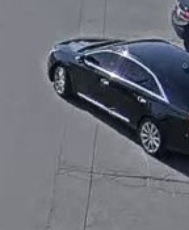 Suspect's vehicle, black Cadillac