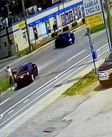 Surveillance image of black Acura