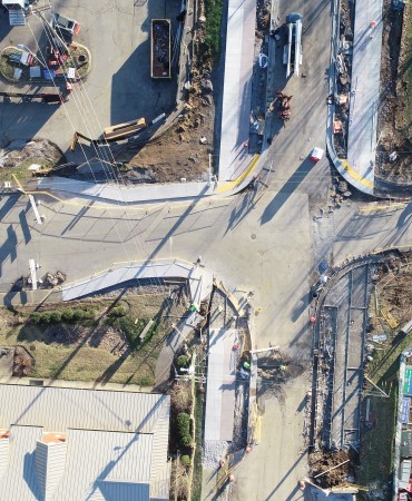 Phase 2 streetscaping at Madison Street and Madison Station Blvd. Poured sidewalk at the north and southwest intersection.