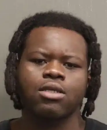 Alhagie J. Camara, 21