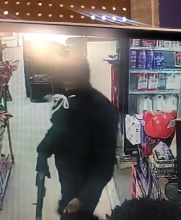 Male Suspect with Gun