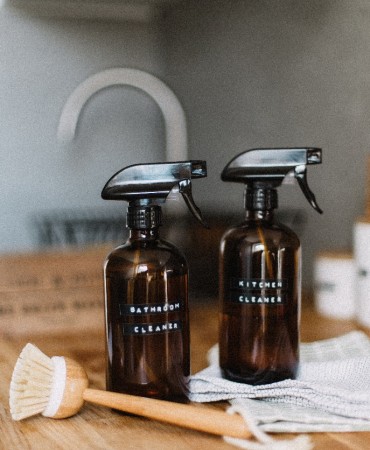 Refillable cleaning supply bottles