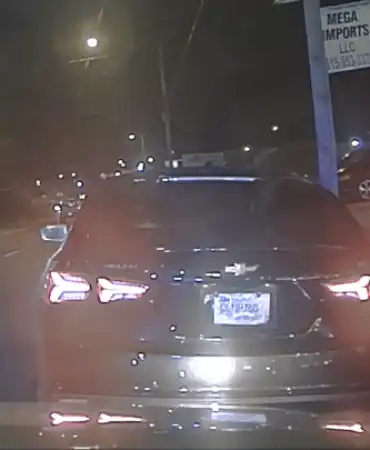 Chevrolet Malibu with a temporary tag Q0NH76