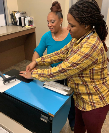 Manual fingerprinting with black printers ink