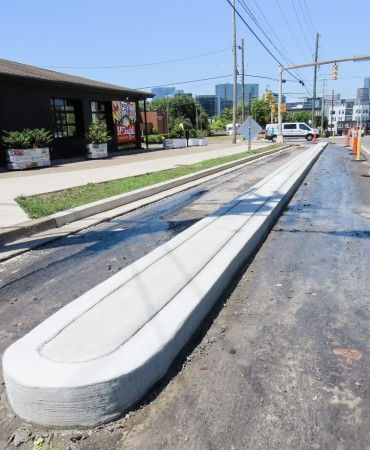 Completed concrete barrier on 12th Ave South at South Street. 