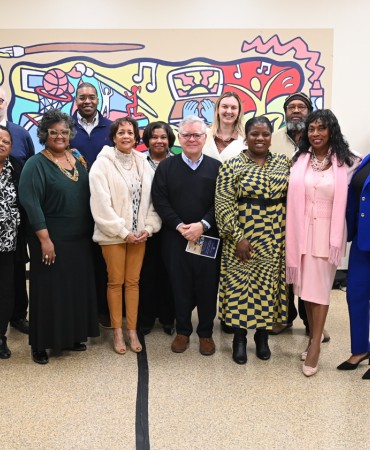 Mayor John Cooper standing with attendees at Participatory Budgeting celebration