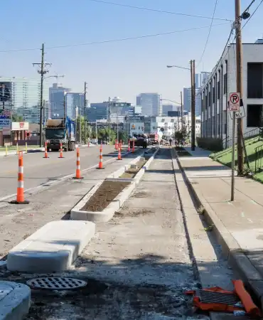 Completed concrete, bioswale, and planted islands on 12th Ave South between South Street and Archer Street