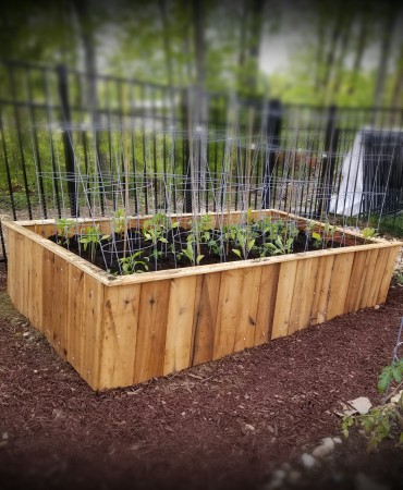 raised garden bed made from recycled materials
