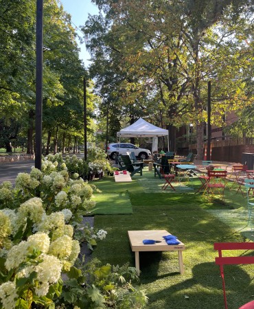 urban parking lot temporarily transformed into green space