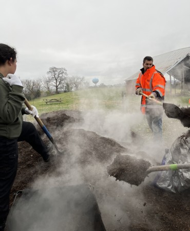 volunteers working with mulch