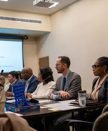 Mayor Sitting in Community Advisory Committee Meeting