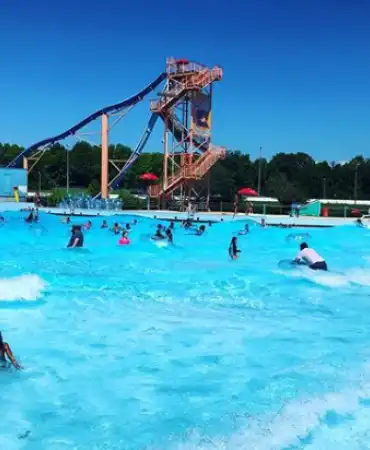 pool at Wave Country with water slide in background